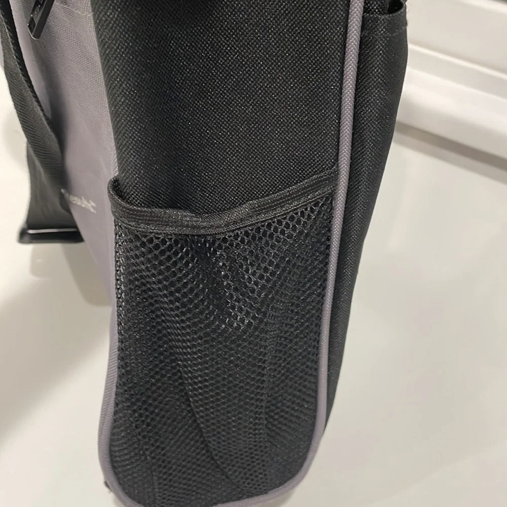Black and grey canvas messenger bag. NWT